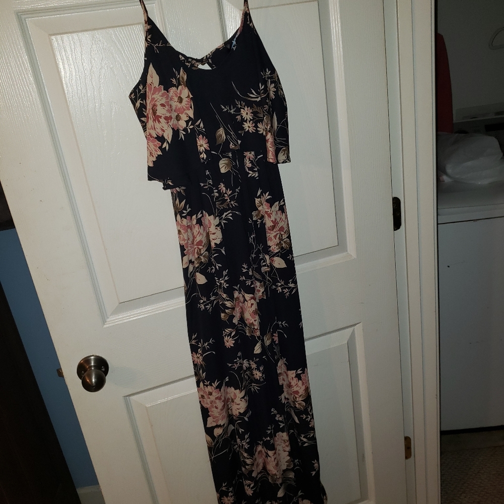 Floral sundress on a black background.  Love Culture size medium